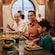 A family dining at Mowgli's Eatery on the Disney Adventure cruise ship" style